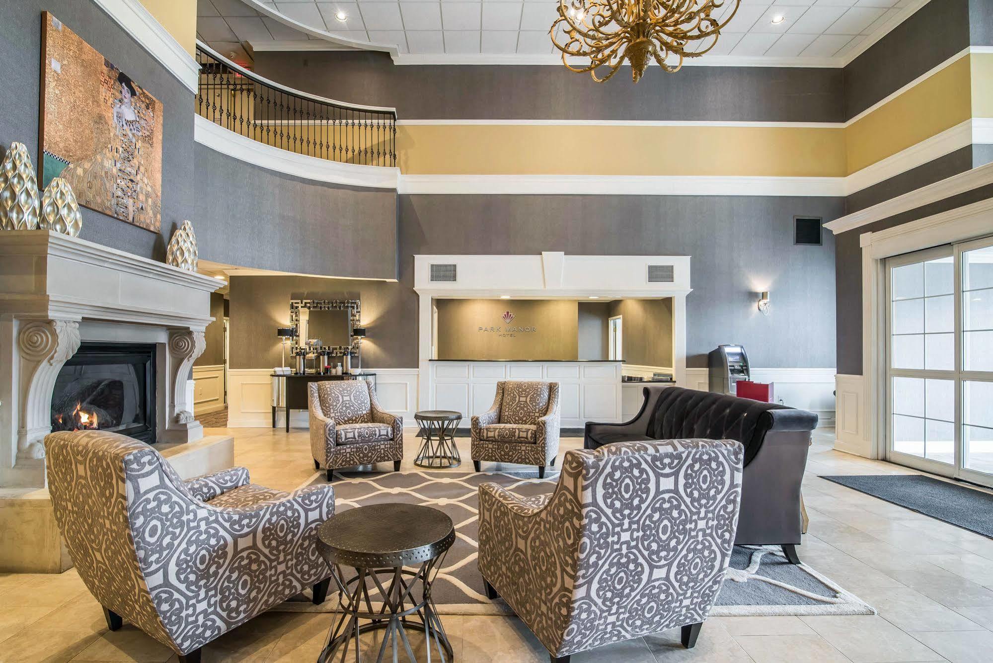 Park Manor Hotel Clifton Park Ngoại thất bức ảnh The lobby of the Best Western Premier Executive Residency Royal Palm Beach